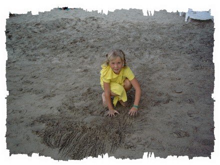 Cute girl playing on the beach